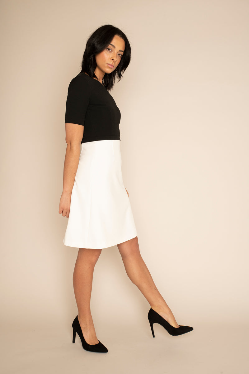 Black sleeved Catherine top with the ivory a-line VICTORIA skirt with our signature Careaux zip around the waist.