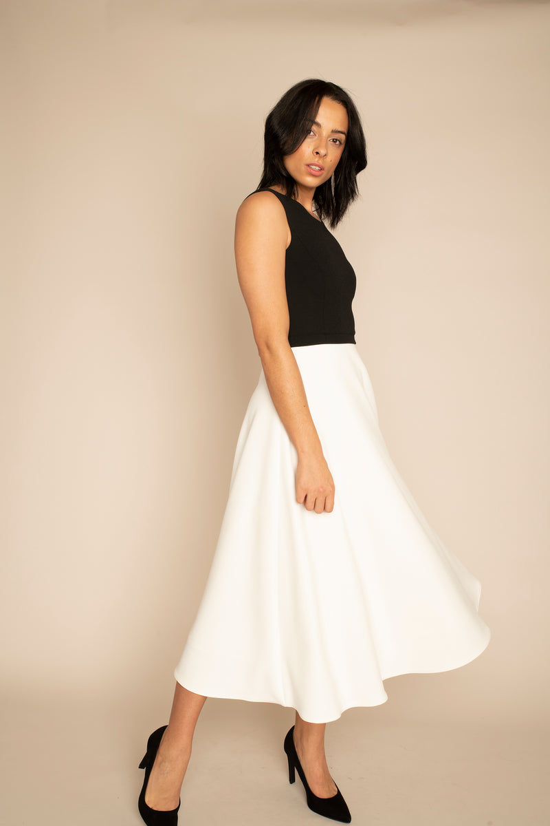 Black Sleeveless Eleanor Top with the Ivory Midi Elizabeth Skirt with our signature Careaux zip around the waist.