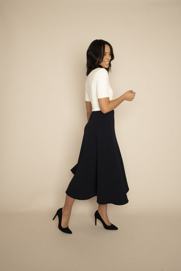 Ivory sleeved Catherine top with navy midi Elizabeth skirt with our signature Careaux zip around the waist. 