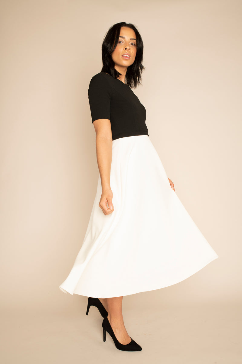 Black Sleeved Catherine Top with the Ivory Midi Elizabeth Skirt with our signature Careaux zip around the waist.