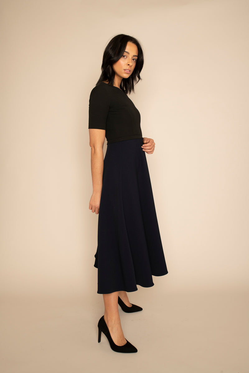Black Sleeved Catherine Top with the Navy Midi Elizabeth Skirt with our signature Careaux zip around the waist.