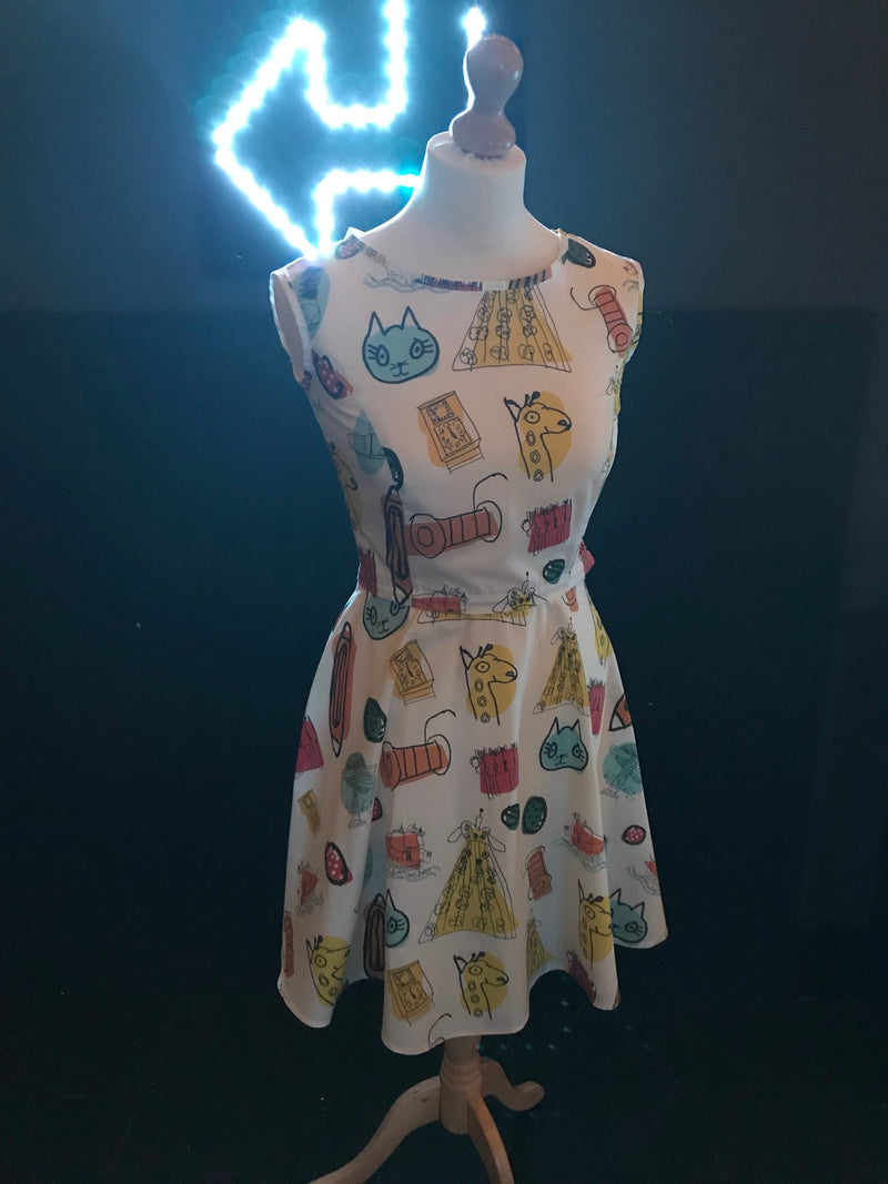 Organic Cotton Print Careaux Dress with our signature Careaux zip around the waist.