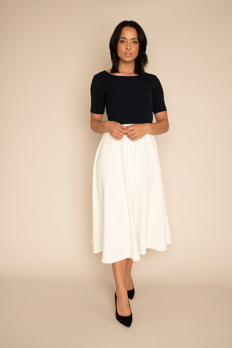 Navy sleeved Catherine top with the ivory midi ELIZABETH skirt with our signature Careaux zip around the waist.