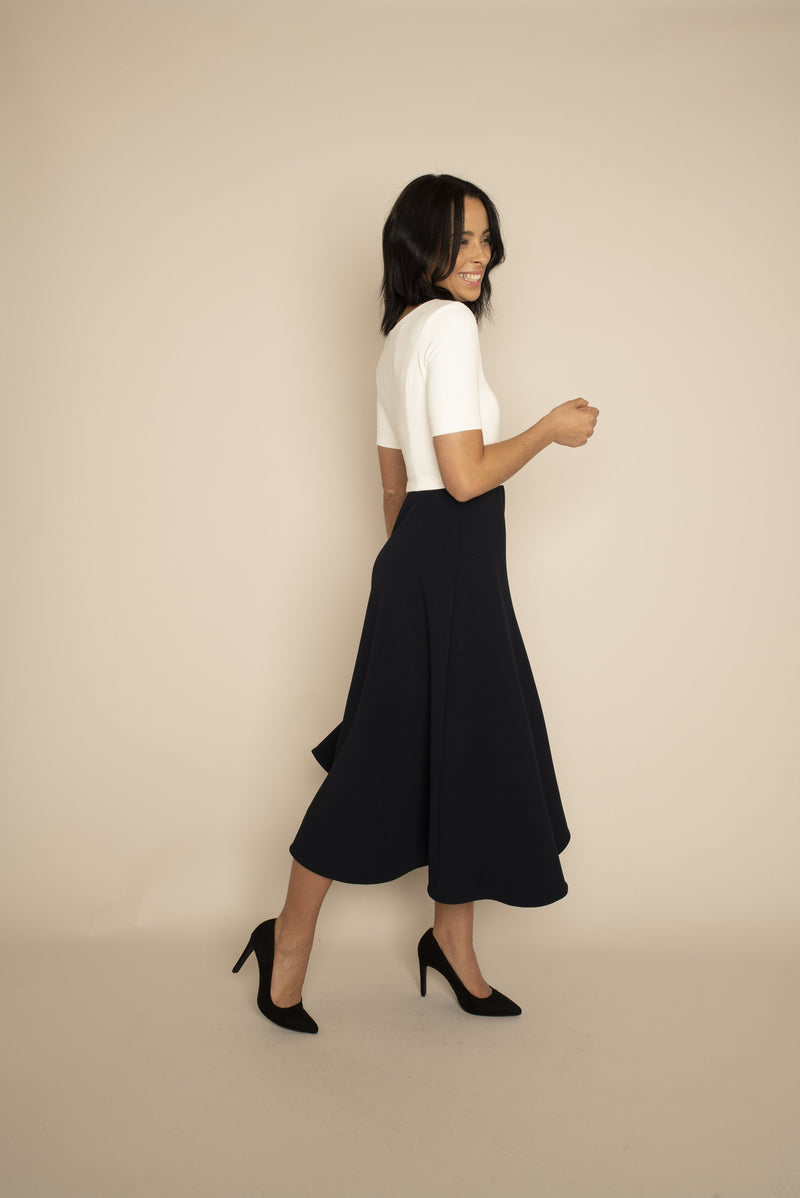 Ivory sleeved Catherine top with navy midi Elizabeth skirt with our signature Careaux zip around the waist. 