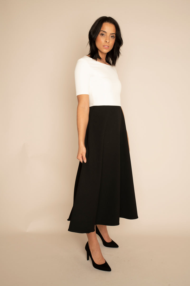 Ivory Sleeved Catherine Top with the Black Midi Elizabeth Skirt with our signature Careaux zip around the waist.