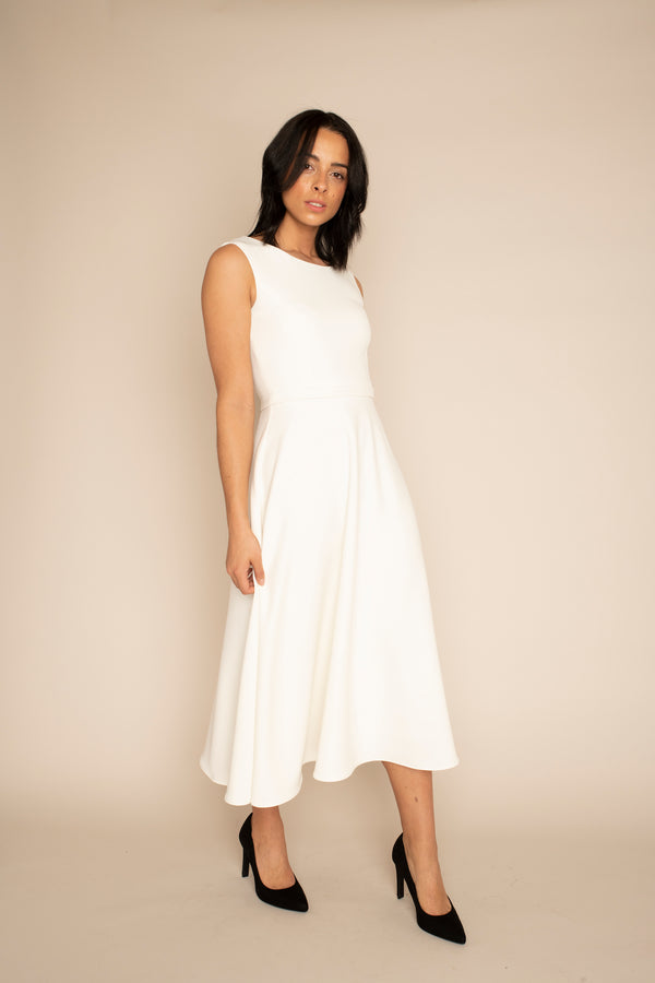 Ivory Sleeveless Eleanor Top with the Ivory Midi Elizabeth Skirt with our signature Careaux zip around the waist.