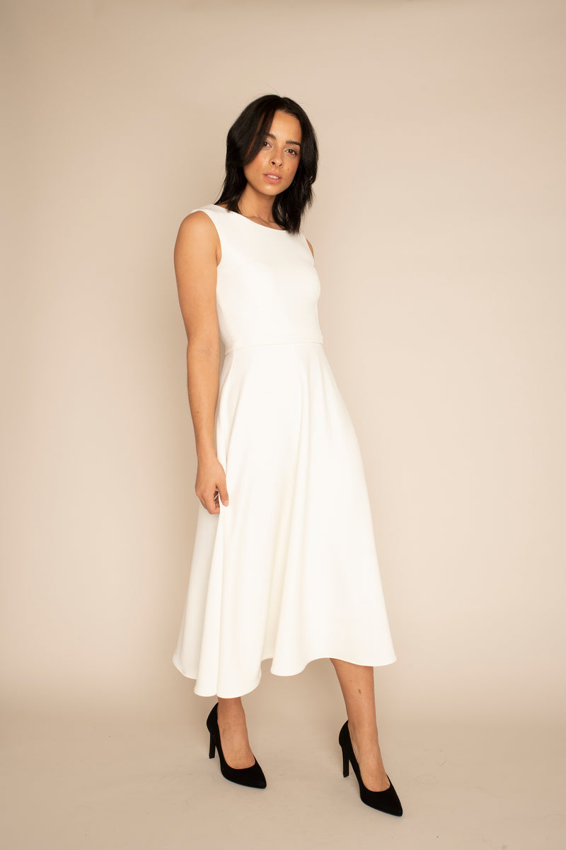 Ivory Sleeveless Eleanor Top with the Ivory Midi Elizabeth Skirt with our signature Careaux zip around the waist.