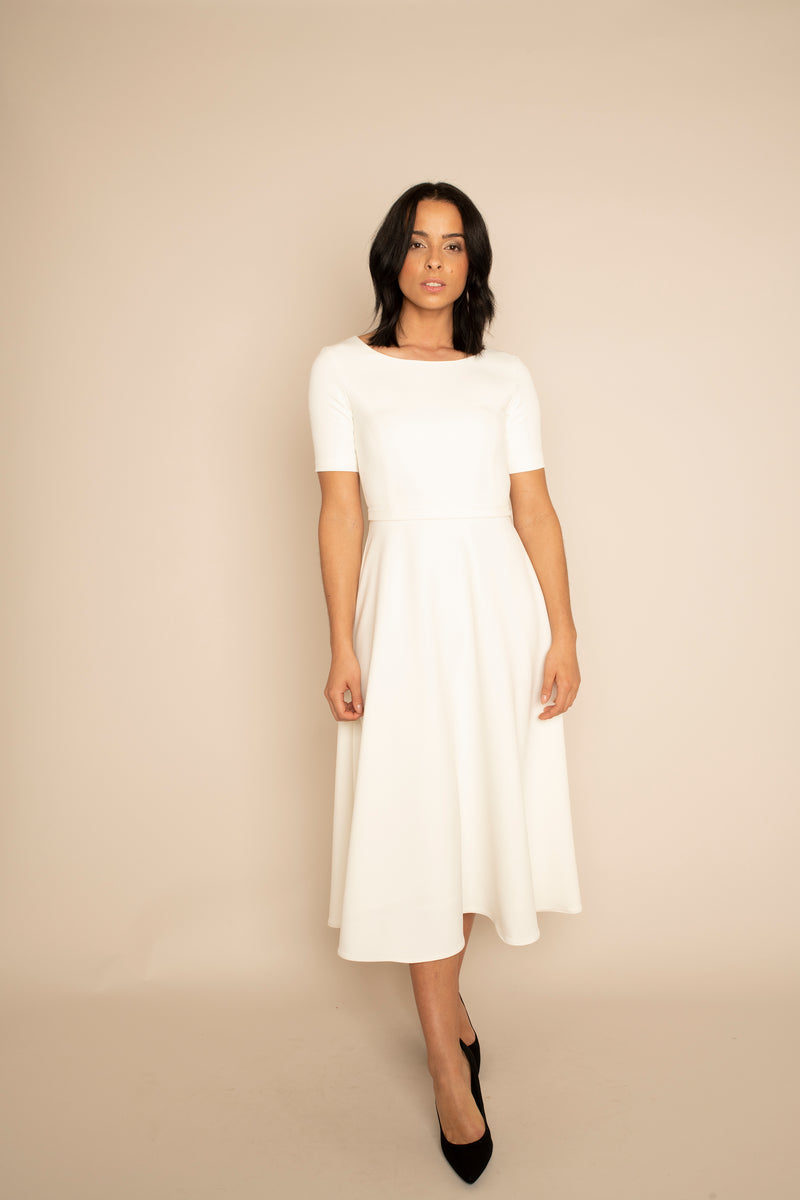 Ivory Sleeved Catherine Top with the Ivory Midi Elizabeth Skirt with our signature Careaux zip around the waist.
