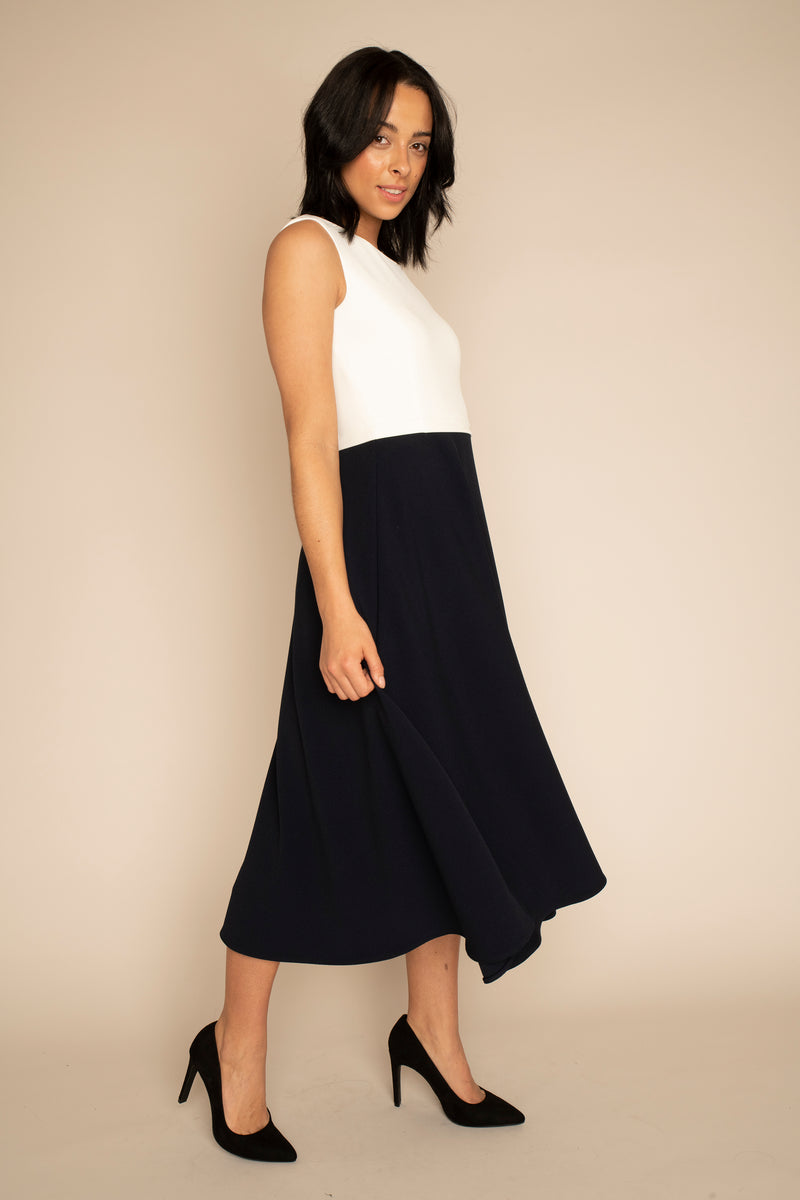 Ivory Sleeveless Eleanor Top with the Navy Midi Elizabeth Skirt with our signature Careaux zip around the waist.