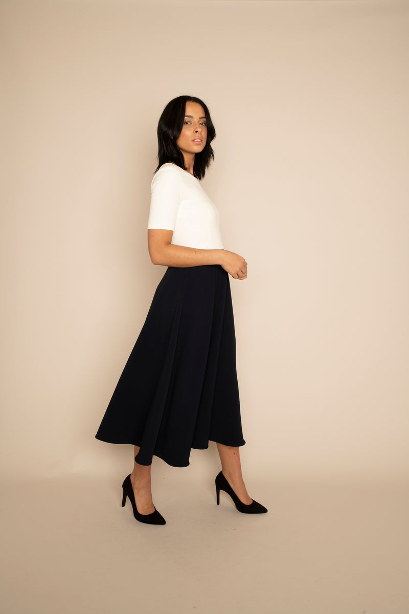 Ivory Sleeved Catherine Top with the Navy Midi Elizabeth Skirt with our signature Careaux zip around the waist.