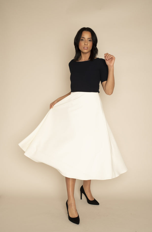 Navy Sleeved Catherine Top with the Ivory Midi Elizabeth Skirt with our signature Careaux zip around the waist.