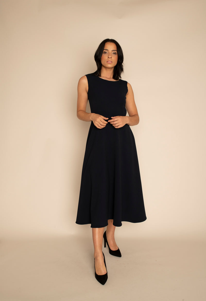 Navy Sleeveless Eleanor Top with the Navy Midi Elizabeth Skirt with our signature Careaux zip around the waist.